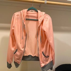 Light zip up sweat jacket.